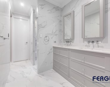 Residential Bathroom Design featuring a meticulously crafted vanity cabinet with sink & mirror by Fergus Builders Residential, Industrial & Commercial real estate development Mackay
