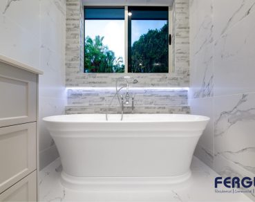 Residential Bathroom Design featuring a meticulously crafted vanity cabinet with sink & Bathtub by Fergus Builders Residential, Industrial & Commercial real estate development Mackay