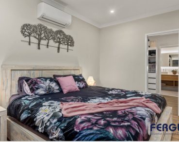 Residential Master's Bedroom design, complete with a thoughtfully integrated AC by Fergus Builders Residential, Industrial & Commercial real estate development Mackay
