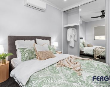 Residential Bedroom design, complete with a thoughtfully integrated cabinets by Fergus Builders Residential, Industrial & Commercial real estate development Mackay