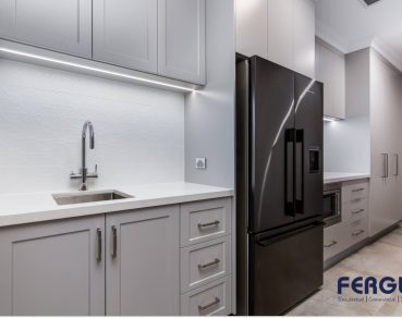 Residential Prep Kitchen design showcasing a seamlessly integrated built-in cabinet and sink by Fergus Builders Residential, Industrial & Commercial real estate development Mackay