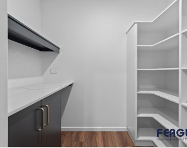 Residential Prep Kitchen design showcasing a seamlessly integrated built-in cabinet by Fergus Builders Residential, Industrial & Commercial real estate development Mackay