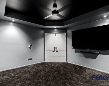 Residential Indoor Living Room design with a seamlessly integrated built-in rack and TV unit by Fergus Builders Real Estate development Mackay