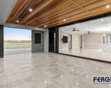 Residential Outdoor Living Area featuring sleek Black Framed Bifold Doors design by Fergus Builders Residential, Industrial & Commercial real estate development Mackay