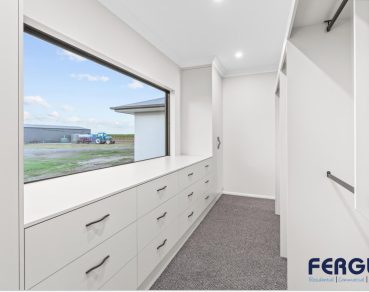 Residential Walk-in Closet design adorned with fixed windows by Fergus Builders Residential, Industrial & Commercial real estate development Mackay
