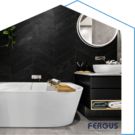 Residential Bathroom Design featuring an elegant vanity cabinet with sink and mirror, complemented by a luxurious bathtub by Fergus Builders Residential, Industrial & Commercial real estate development Mackay